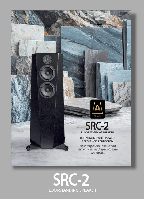Elegant SRC-2 stereo speakers set in a marble backdrop.