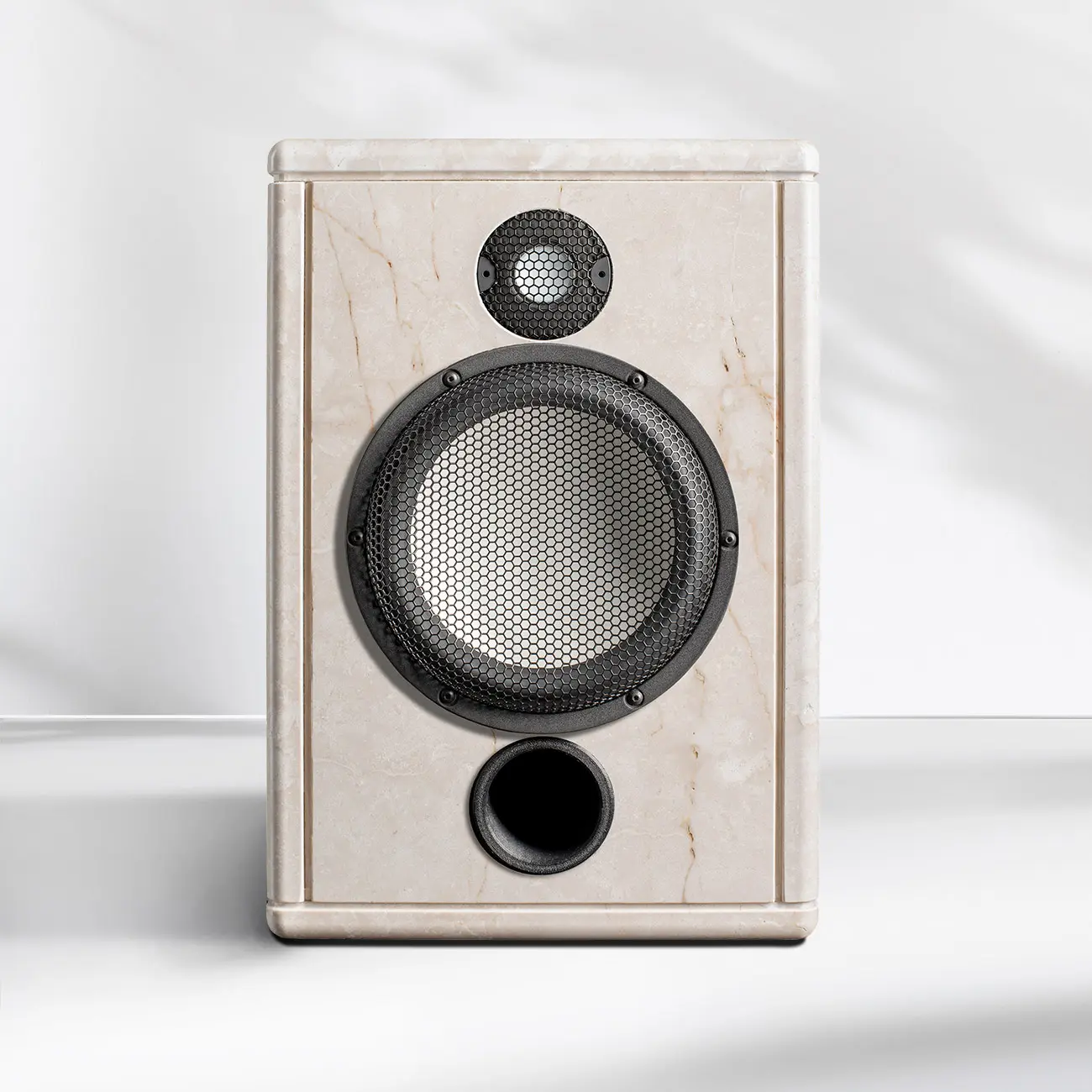 A modern white speaker with black speaker cones on a white background.