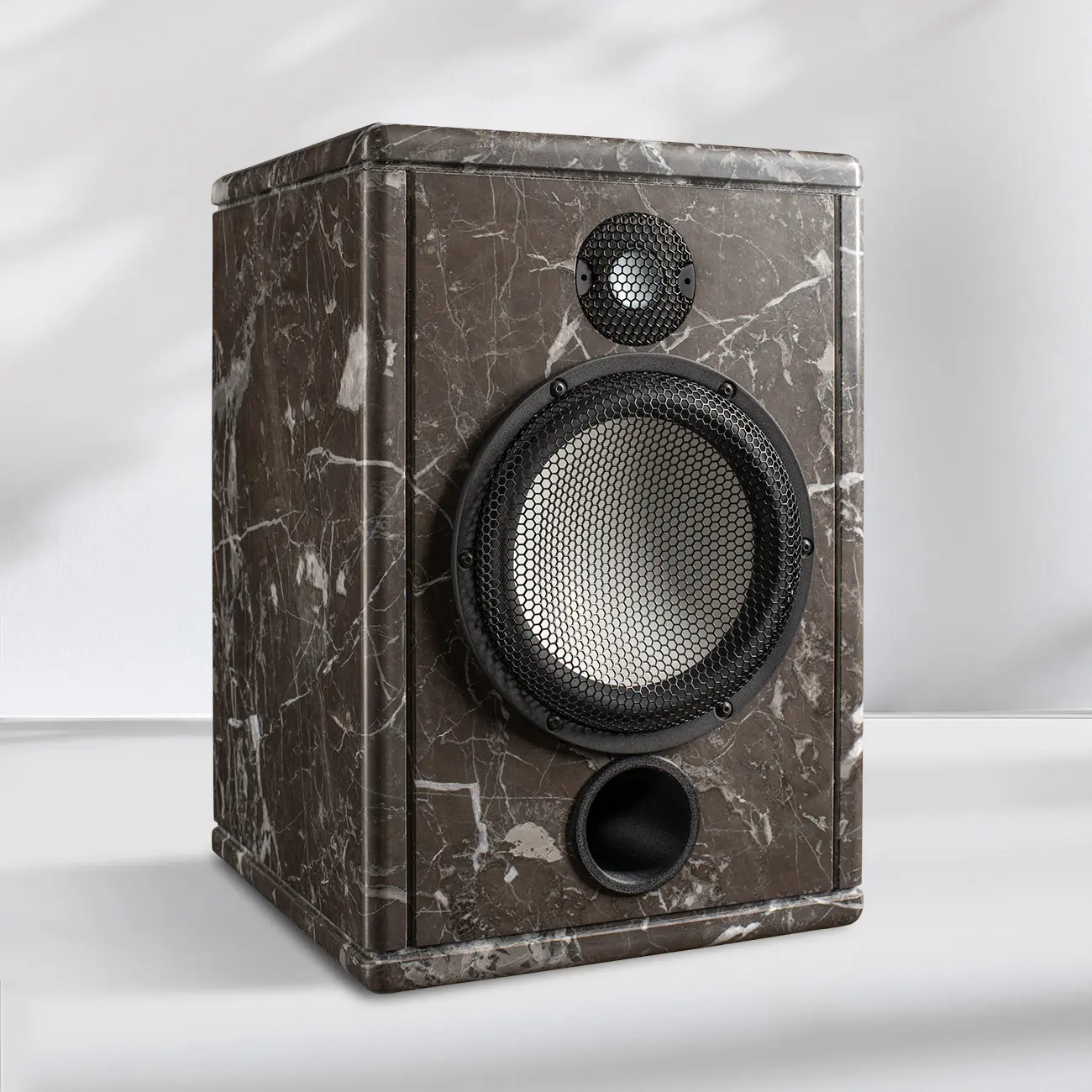 A weathered vintage camera lens on a textured box.
