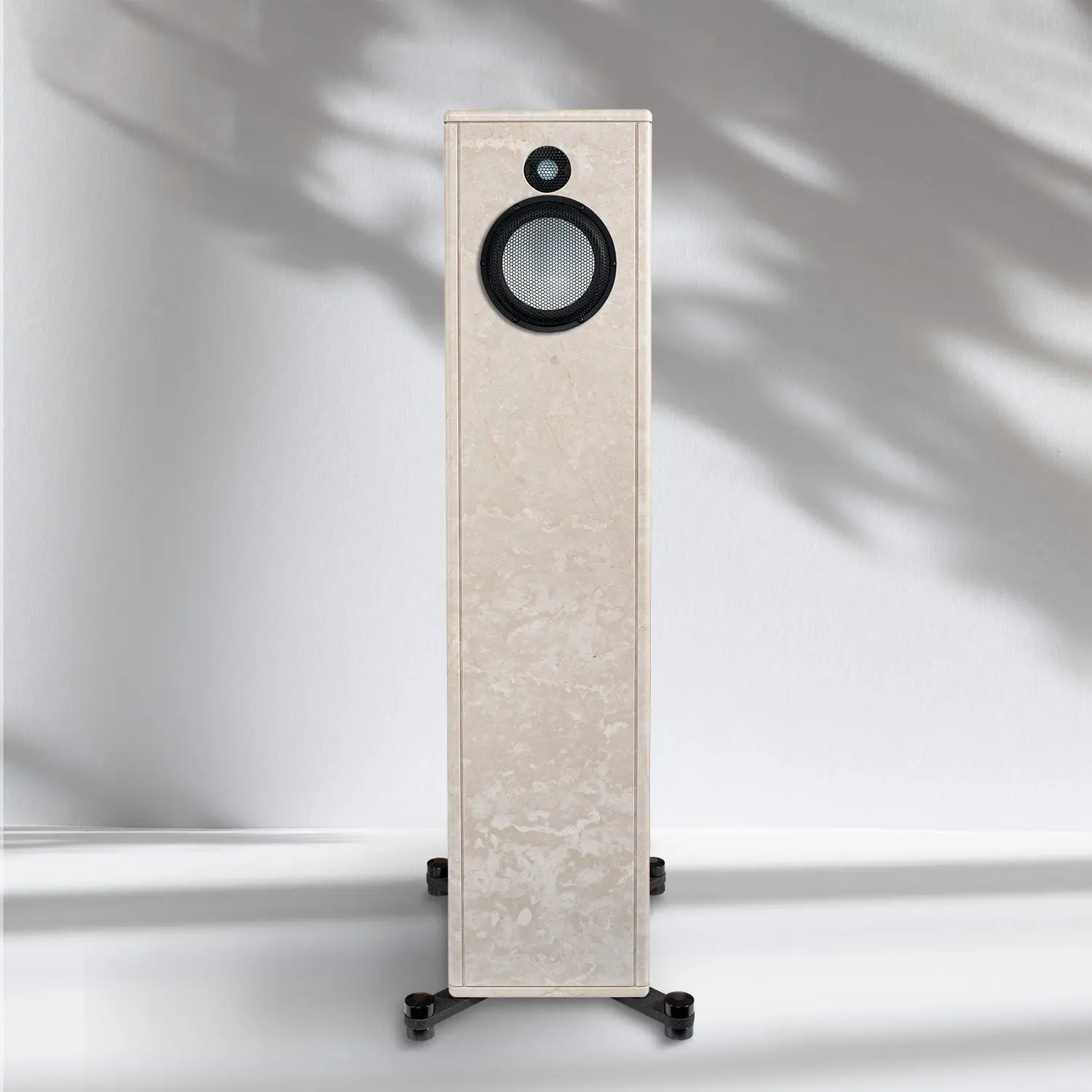 Tall floor-standing speaker with a beige textured finish and black base.