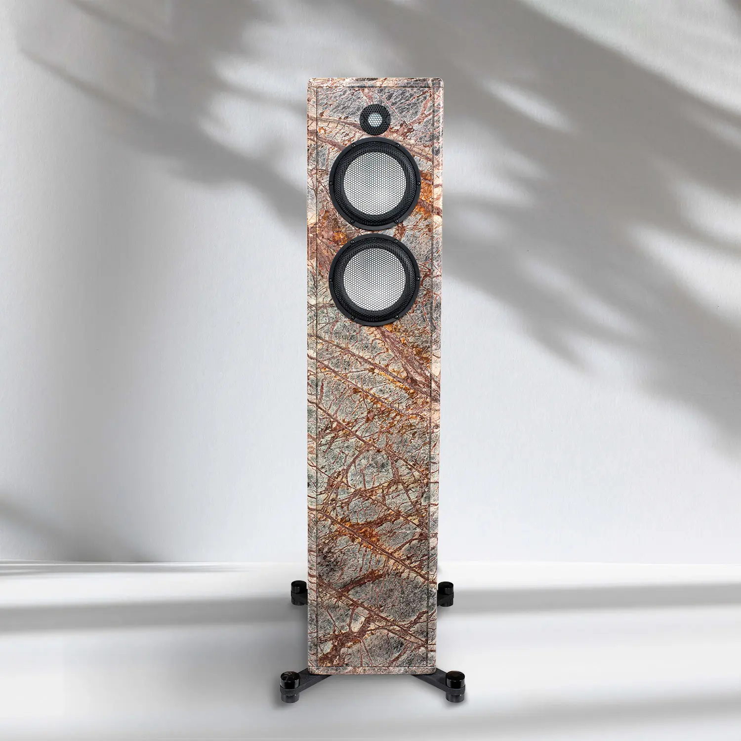 Tall granite floor-standing speaker with two circular drivers.
