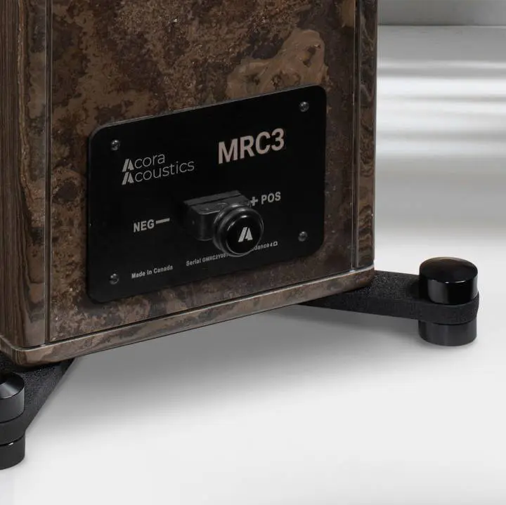 Close-up of a rusted MRC3 electronic device on a stand.