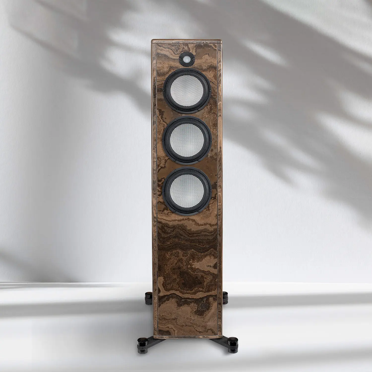 Elegant wooden floor-standing speaker with three drivers and caster wheels.