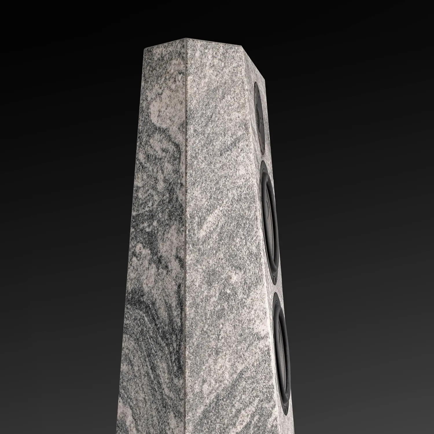 Close-up of a tall, textured stone pillar with intricate patterns.
