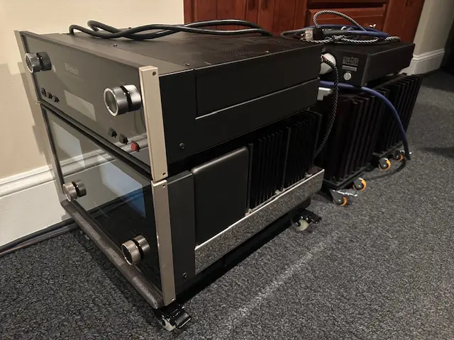 High-end audio equipment setup with amplifiers and cables.