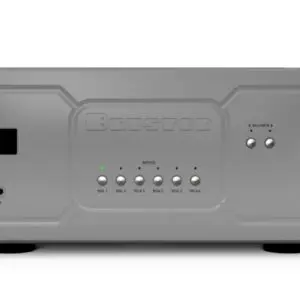 Close-up of a stereo audio amplifier with control knobs and buttons.