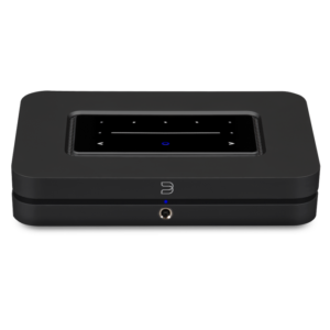 Compact black wireless router with LED indicators and Ethernet port.