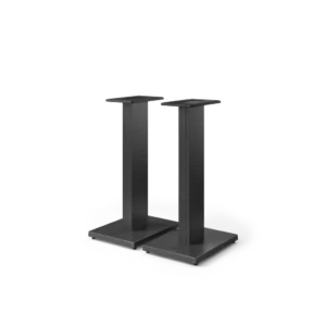 Metal detector gate on a circular platform in a plain setting.